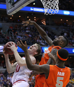 Cody Zeller #40 of the Indiana Hoosiers puts the ball up to the basket against Rakeem Christmas #25 and C.J. Fair #5.