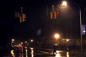 The streets near Syracuse University are deserted Monday night as campus prepares for the arrival of Hurricane-turned Superstorm Sandy. Buses continued to run, although the university canceled classes for part of Monday and all of Tuesday  due to heavy rain and wind.