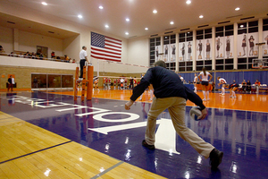 The Syracuse men's club volleyball team helps out the women's program by preparing the Women's Building for matches, among other responsibilities. In exchange, the club team earns funding.