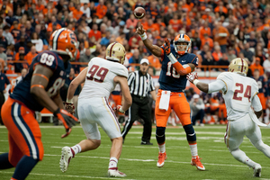 Terrel Hunt releases a pass in Syracuse's 34-31 victory over Boston College on Saturday. Hunt executed offensive coordinator George McDonald's play calling as the Orange qualified for its third bowl game in four seasons.