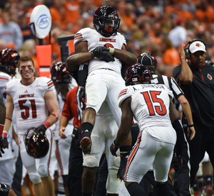 Louisville, pictured above during last year's game at the Carrier Dome, was upset at home by Houston on Saturday. 