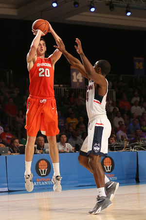 Tyler Lydon scored 16 points and collected 12 rebounds in Syracuse's 79-76 win over Connecticut. 