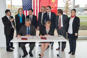 Representatives from both the Syracuse University Center for Excellence and Nanjing University in China sign a memorandum of understanding cementing the researching partnership between the two schools. 