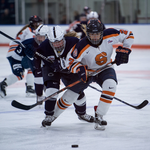 This photo, from Friday night's game, pictures Syracuse's Logan Hicks chasing down a puck in Syracuse's defensive zone. The Orange fought off all but one of Penn State's 19 power-plays on the weekend. 