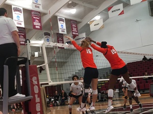 Santita Ebangwese (right) had a team-leading 16 kills on Friday night against Towson. 