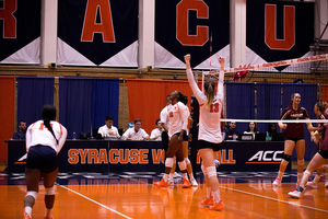 Syracuse celebrates after a point against Boston College.