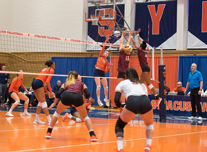 Polina Shemanova goes up for a spike against Virginia Tech. SU struggled against Penn State's strong group by the net.