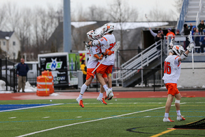 Syracuse celebrates after a goal in its win over Duke two weeks ago.