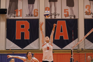 Freshman Lauren Woodford sets the ball in Syracuse's 3-1 win.