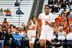 Kiara Lewis (left) scored 23 points and Teisha Hyman had seven steals in Syracuse's first road win since Jan. 19.