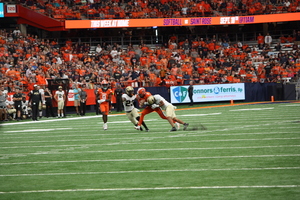 After being stuffed by the Purdue defense in the first half, Garrett Shrader threw for three touchdowns in the final 30 minutes in the Orange's comeback win.