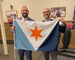  Hart’s design is named “The First Light Flag” and was selected by the Syracuse Common Council on June 20. As an alum of the university, he said that he used his knowledge from classes at SU in his design process.