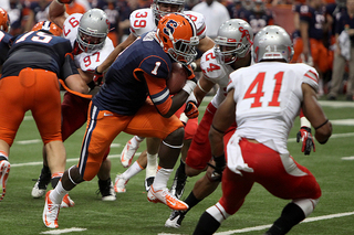 Ashton Broyld takes a run up the middle through the Stony Brook defense.