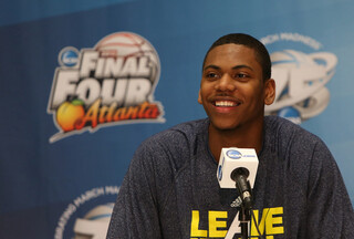 Glenn Robinson III (1) of the Michigan Wolverines speaks during the Final Four interviews.