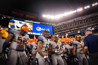 Ritchy Desir amps up his fellow teammates before storming onto the field.