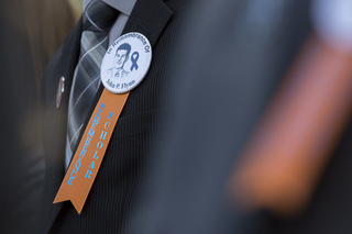 Each Remembrance Scholar wore a ribbon with a photo of the student they were representing.