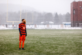 Delhommelle stood alone on the field after the Orange left.