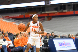 Gabrielle Cooper dribbles up the court for Syracuse in its win.