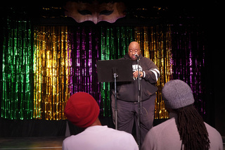 Multidisciplinary artist and Syracuse employee Cedric T. Bolton performs a spoken word poem.