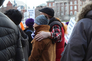 Protestors stand together listening to the organizations and supporters talk at Crouse-Hinds Hall. The demonstration concluded outside of the administration offices where the crowd met the presentation of letters from each organization asking upper administration to acknowledge the union with cheers and applause. 